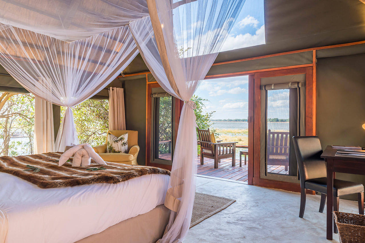 Deluxe Suite with star gazing window overlooking Zambezi River and private deck