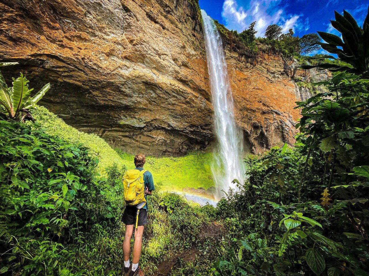 Hiker at Sipi main waterfall. Photo credit Juma Chebet @jumachebet Large